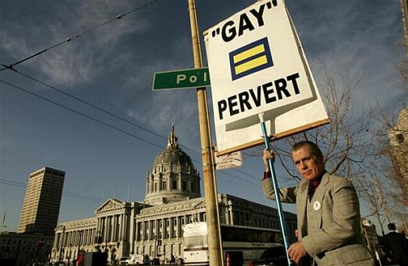 Don Grundmann, an opponent of gay marriage, carries a signboard outside the California supreme court
