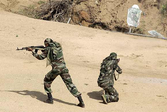 Security personnel train at a counter-terrorism and jungle warfare school in Kanker village, about 140 km south of Raipur