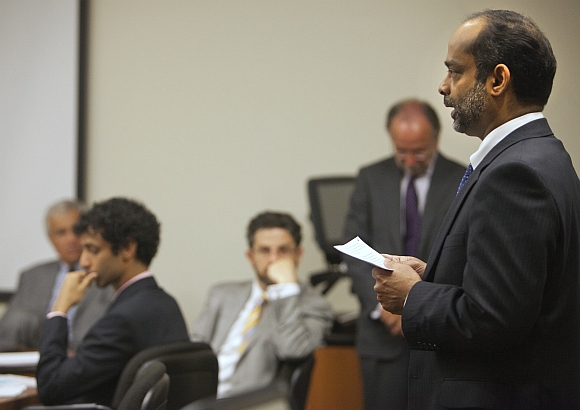 Ravi Pazhani, father of Dharun Ravi reads a statement during a hearing in New Brunswick, New Jersey