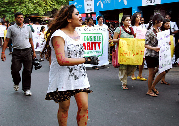 A woman shouts slogans against sexual harrasment during the parade in Kolkata