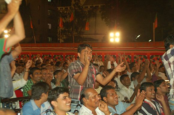 The crowd cheering Modi speech