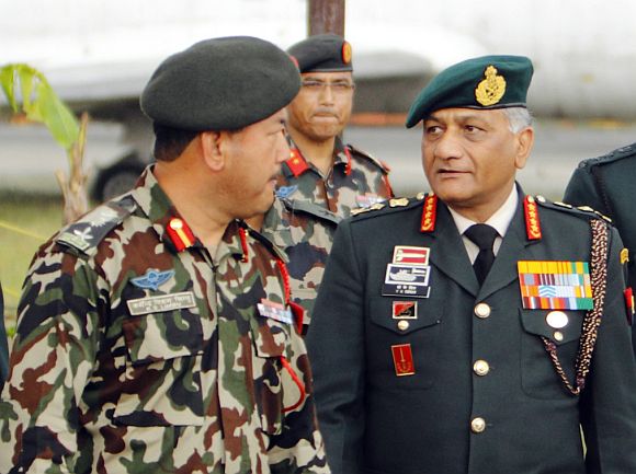 General V K Singh walks during a regional seminar organised by the Nepal army, in Kathmandu