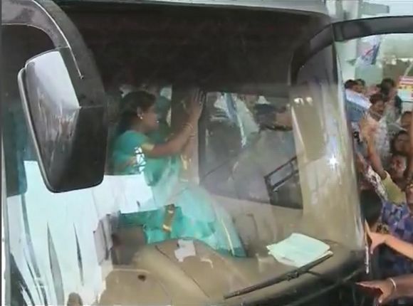 Video grab shows Vijayamma waving to crowds during the road show