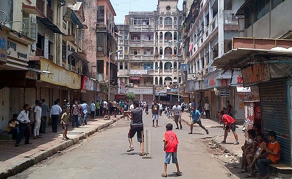 With Mumbai shutting down with glee, children took to the empty streets to indulge in their favourite sport: gully cricket