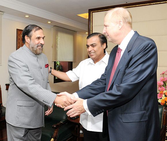 British Petroleum CEO Robert Dudley and Mukesh Ambani, meeting Commerce Minister Anand Sharma in New Delhi on September 28, 2011.