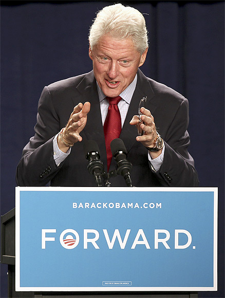 Clinton speaks at a concert rally to re-elect Obama