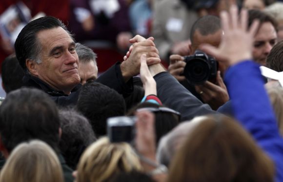 Republican presidential nominee Romney greets supporters at a campaign rally in Newington on Saturday