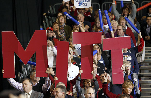 Supporters of Republican presidential nominee and former Massachusetts Governor Mitt Romney attend a campaign rally in Cleveland, Ohio