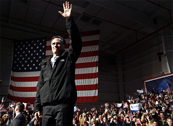 Romney arrives at a campaign rally in Newport News, Virginia