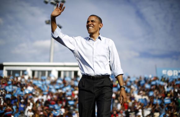 Barack Obama waves to his supporters at a campaign rally in Florida