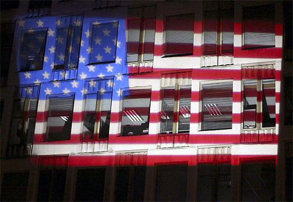 America's national flag is projected on the facade of the US embassy in London to mark the US polls