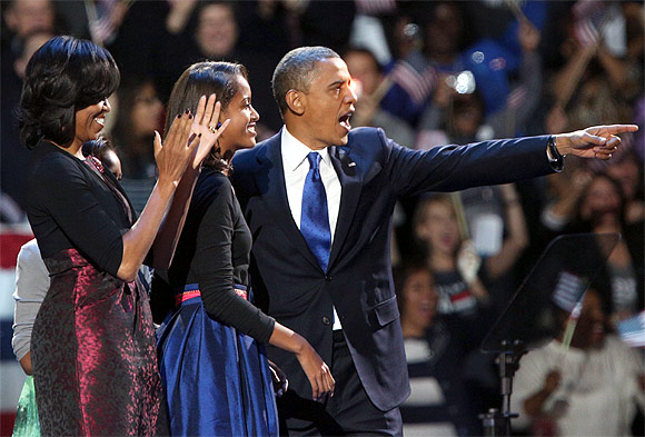 Obama with his family at the rally in Chicago