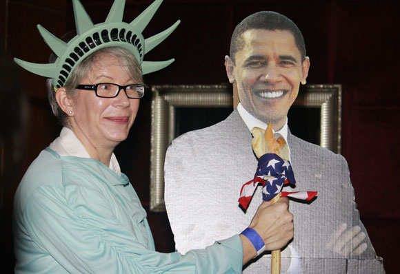 Yet another consular officer dresses up as Lady Liberty and raises a toast (literally) for Obama