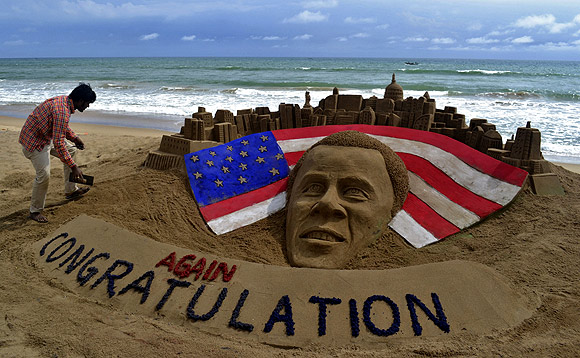 A sand sculpture of US President Barack Obama on a beach at Puri