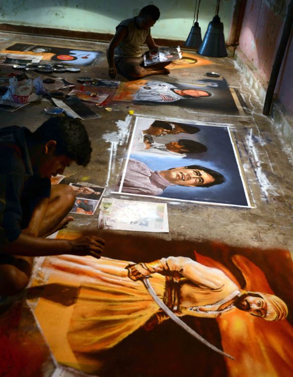 Artists celebrate Diwali creating colourful 'rangolis'