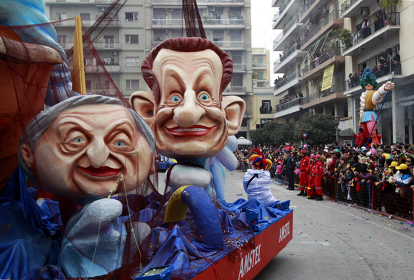 A carnival float depicting France's President Nicolas Sarkozy and former IMF chief Dominique Strauss-Kahn
