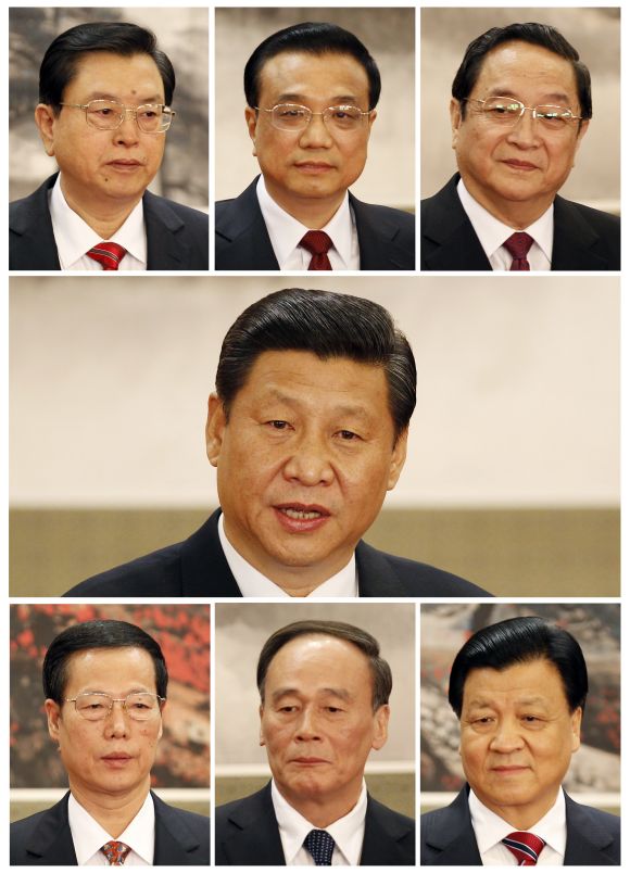  China's Politburo Standing Committee: (1st row from left to right) Zhang Dejiang, Premier Li Keqiang, Yu Zhengsheng, (2nd row) Xi Jinping, (3rd row from left to right) Zhang Gaoli, Wang Qishan, Liu Yunshan. Photograph: Carlos Barria/Reuters