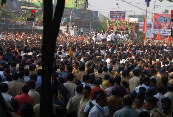 Thousands of Shiv sainiks raised their hands in praise of their departed leader.