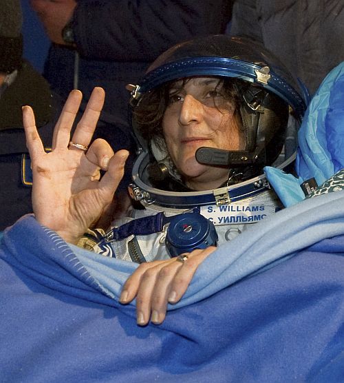 The International Space Station crew member US astronaut Sunita Williams gestures shortly after landing near the town of Arkalyk, in northern Kazakhstan