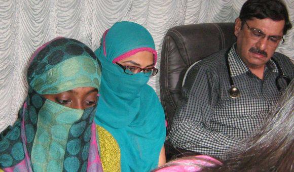 From left, Reenu Srinivasan and Shaheen Dhada with Shaheen's uncle Dr Abdul Gaffar Dhada