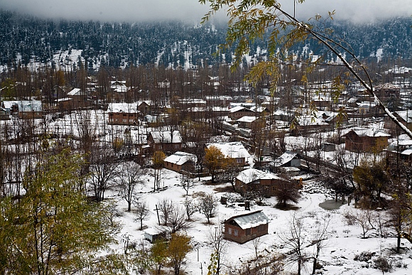 A view of the heavy first snowfall at the Baba Reshi shrine in Gulmarg
