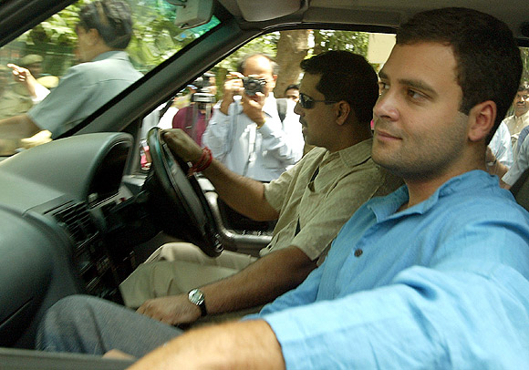Rahul Gandhi accompanied by his brother-in-law Robert Vadra enters his house in New Delhi