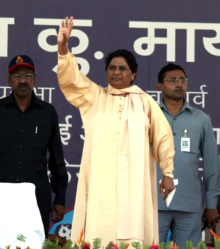 Mayawati waves to her supporters during the rally at Lucknow