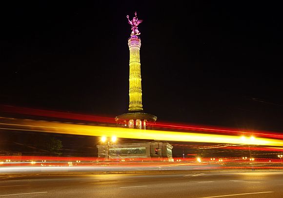 The Siegessaeule (victory column) is illuminated during a technical check for the Festival of Lights in Berlin