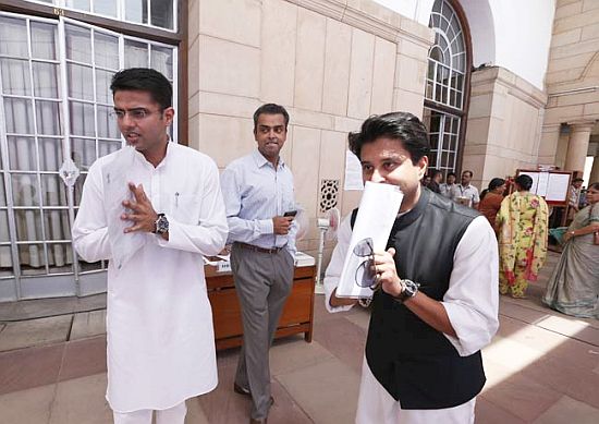 (Left to right) Sachin Pilot and Jyotiraditya Scindia in the Parliament complex. Also seen is Milind Deora