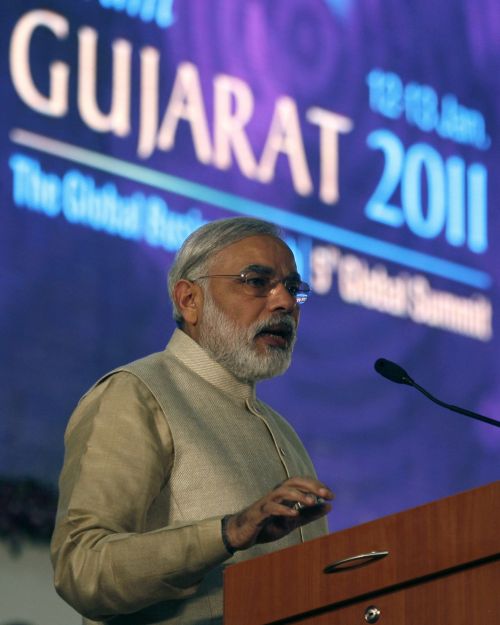 Modi speaks during the Vibrant Gujarat Global Investors' Summit 2011 at Gandhinagar