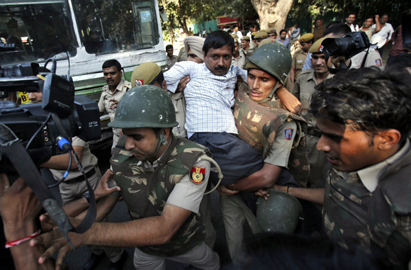 Activist Arvind Kejriwal being detained by the Delhi police
