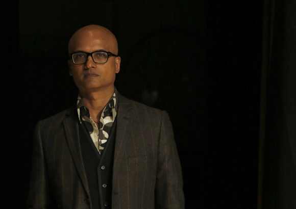 Jeet Thayil of India, one of the shortlisted authors for the 2012 Man Booker Prize, poses for photographers in London