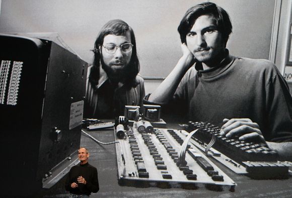 Steve Jobs, right, at an Apple event at the Yerba Buena Center for the Arts in San Francisco