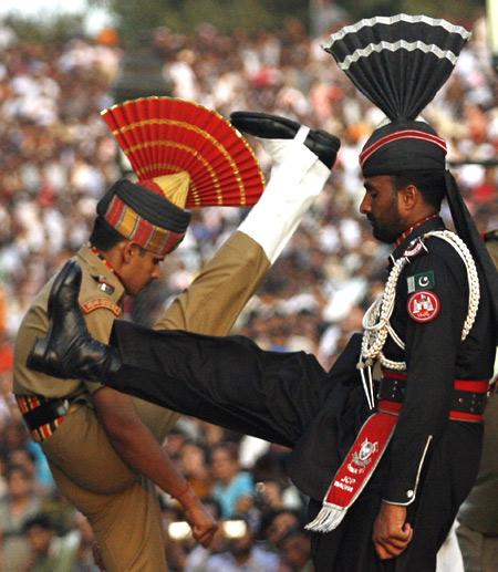 A Pakistani Ranger and a Border Security Force officer during the daily parade at the Wagah border.