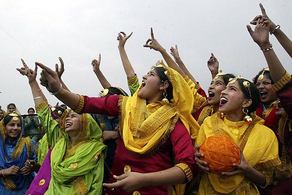 Punjabi girls dressed in traditional finery.