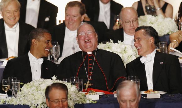 Obama and Romney share a laugh with Cardinal Dolan at the Alfred E. Smith Memorial Foundation dinner in New York