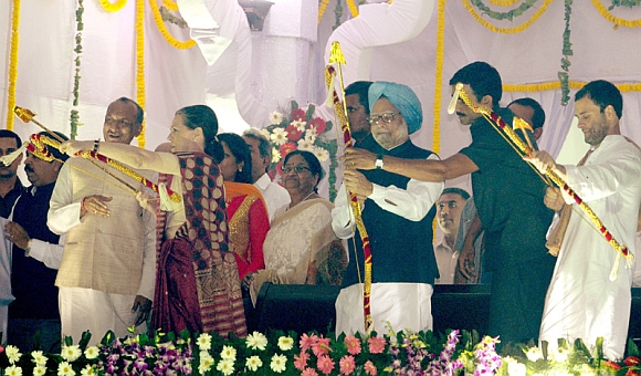 In PICS: PM, Sonia slay their demons at Ramlila Maidan