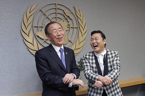 South Korean singer Psy (right) practises some 'Gangnam Style' dance steps with United Nations Secretary-General Ban Ki-moon during a photo opportunity at the UN headquarters in New York