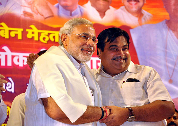 Gadkari and Gujarat Chief Minister Narendra Modi exchange a warm hug.