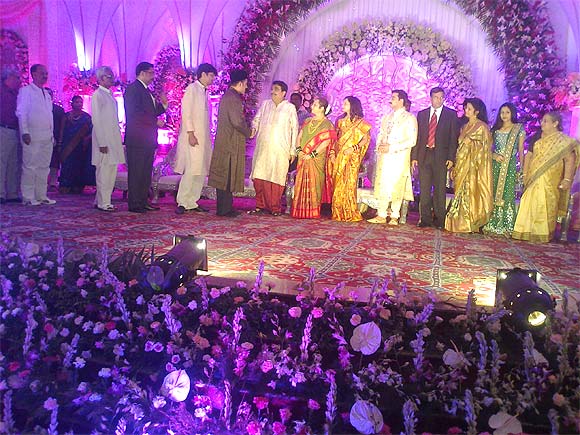 Gadkari greets guests at the wedding of his son, Sarang.