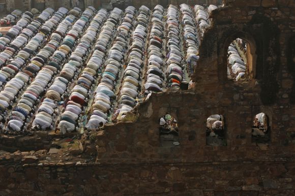 Muslims offer prayers at the ruins of the Feroz Shah Kotla mosque on the occasion of Eid-ul-Azha in New Delhi