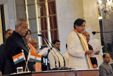 President Pranab Mukherjee administering oath of Minister of State to Shashi Tharoor at Rashtrapati Bhavan on Sunday