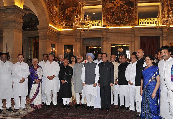 President Mukherjee, Vice President Hamid Ansari and Prime Minister Manmohan Singh with the newly inducted ministers after the swearing-in ceremony at Rashtrapati Bhavan on Sunday