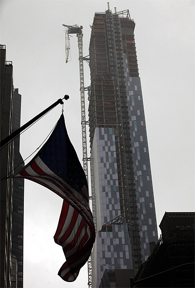 Sandy batters NY: Crane dangles from high-rise, cars float!