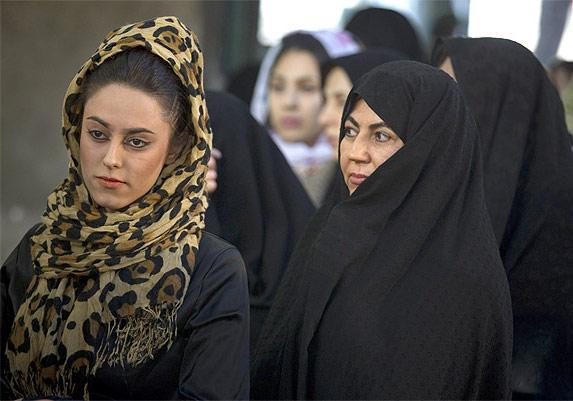 A young Iranian woman, left, with an older Iranian woman in Tehran: Photograph used only for representational purposes