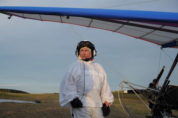 Putin walks after a flight in a motorized deltaplane at Yamalo-Nenets district