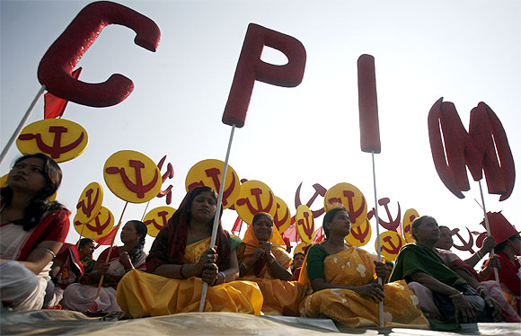 Supporters of the CPI-M attend a public rally in Agartala