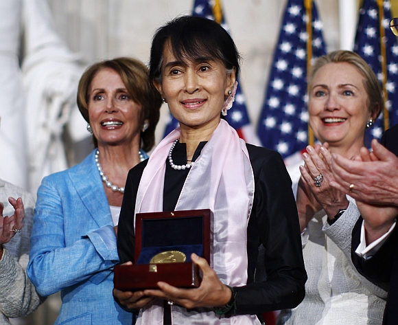 Myanmar opposition leader Aung San Suu Kyi is presented with the Congressional Gold Medal at the United States Capitol in Washington
