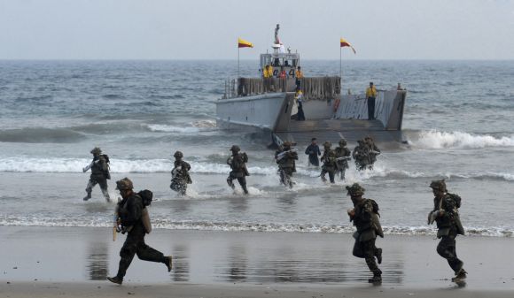 Marine Commandos perform during the annual Navy Day celebrations at Ramakrishna Beach in Visakhapatnam