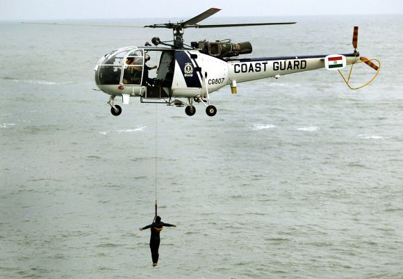 Indian Coast Guard 'Chetak' helicopter takes part in a demonstration near Mumbai coast